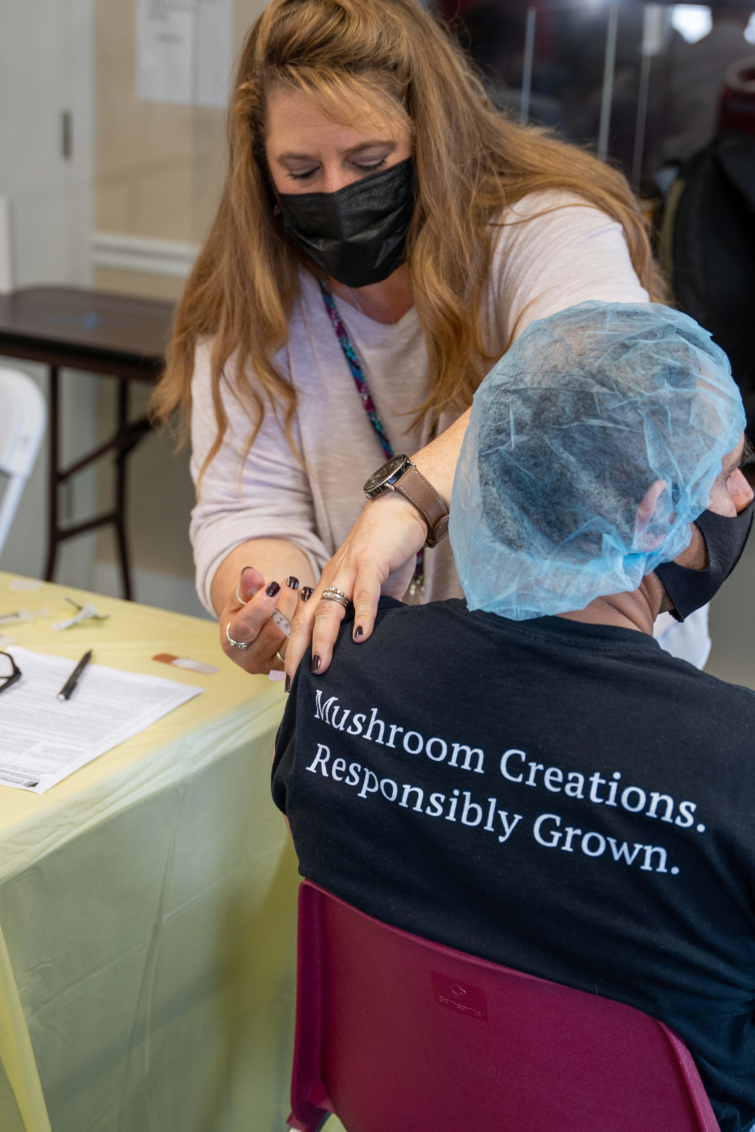 The American Mushroom Institute organized vaccine clinics for Kennett Square's farm workers. (Mark Rutt/Design Design for American Mushroom Institute)