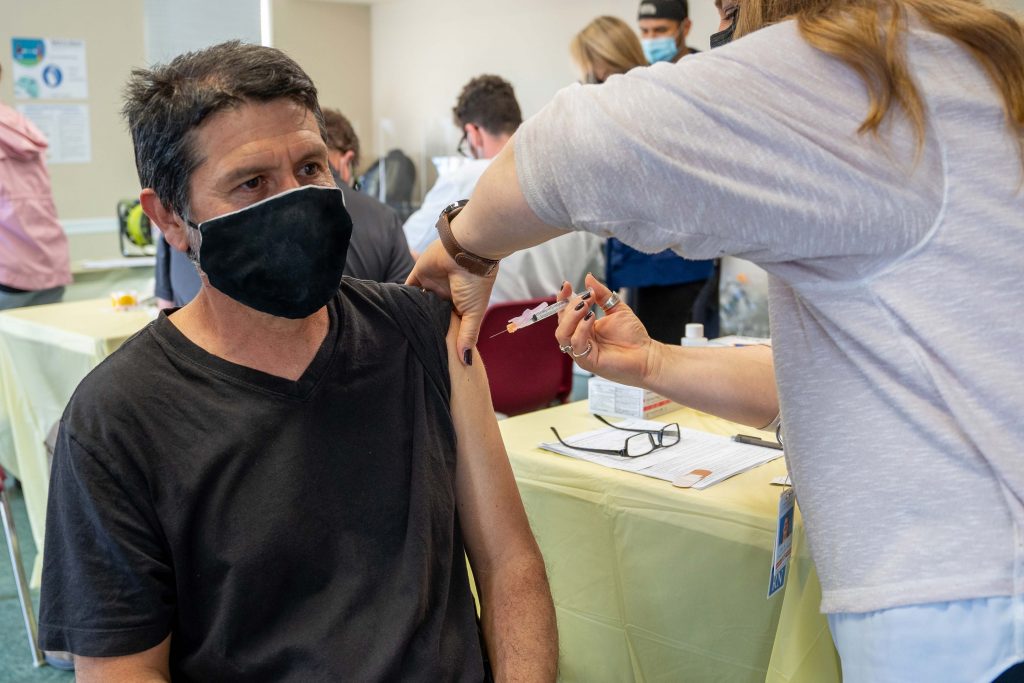 AMI_VAX-1 The American Mushroom Institute organized vaccine clinics for Kennett Square's farm workers. (Mark Rutt/Design Design for American Mushroom Institute)