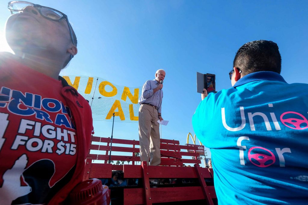 Biden Wages In this Dec. 19, 2019, file photo Democratic presidential candidate former Vice President Joe Biden, speaks at a rally in support of McDonald's cooks and cashiers who are demanding higher wages and union rights, outside a McDonald's restaurant in Los Angeles. (AP Photo/Ringo H.W. Chiu)
