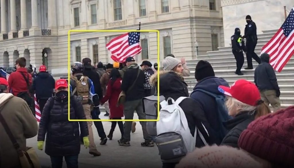 E2Fyzg6XIAM0FTW_1_1920x1080-e1622213077513 In this screengrab posted by an online account that's been identifying people present at the U.S. Capitol on Jan. 6, state Sen. Doug Mastriano (R-Adams), highlighted in a yellow box, appears to walk with a group of demonstrators parallel to the east steps of the Capitol building. (Screenshot)