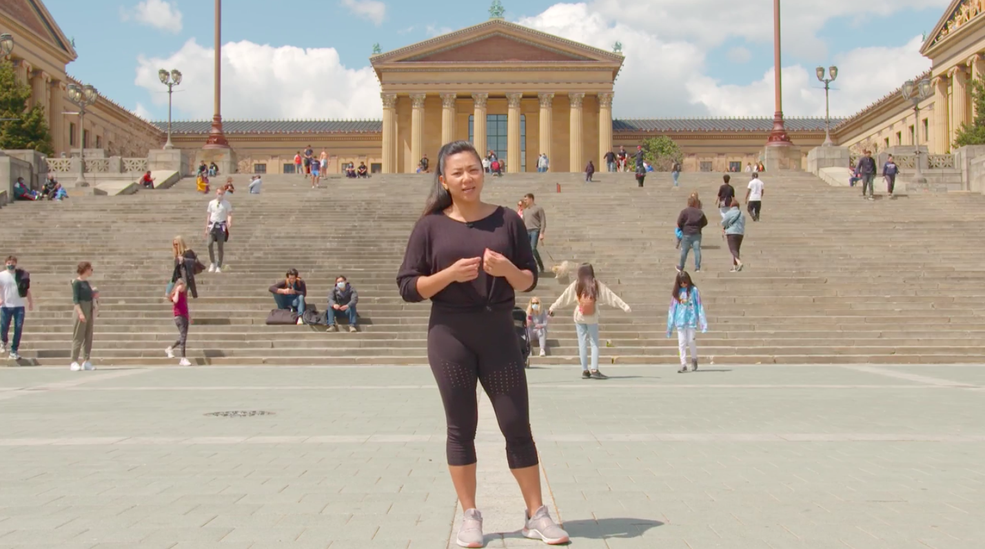 One of the subjects of Visit Philly's marketing videos, Marisel, opened a fitness studio five weeks before the pandemic shutdown. She's excited to have friends and family come to the city again. (Screenshot)
