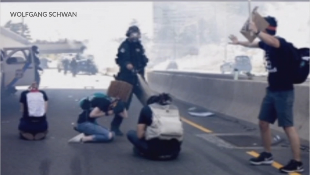Screen Shot 2021-05-17 at 4.55.02 PM Police officer pepper-sprays protesters