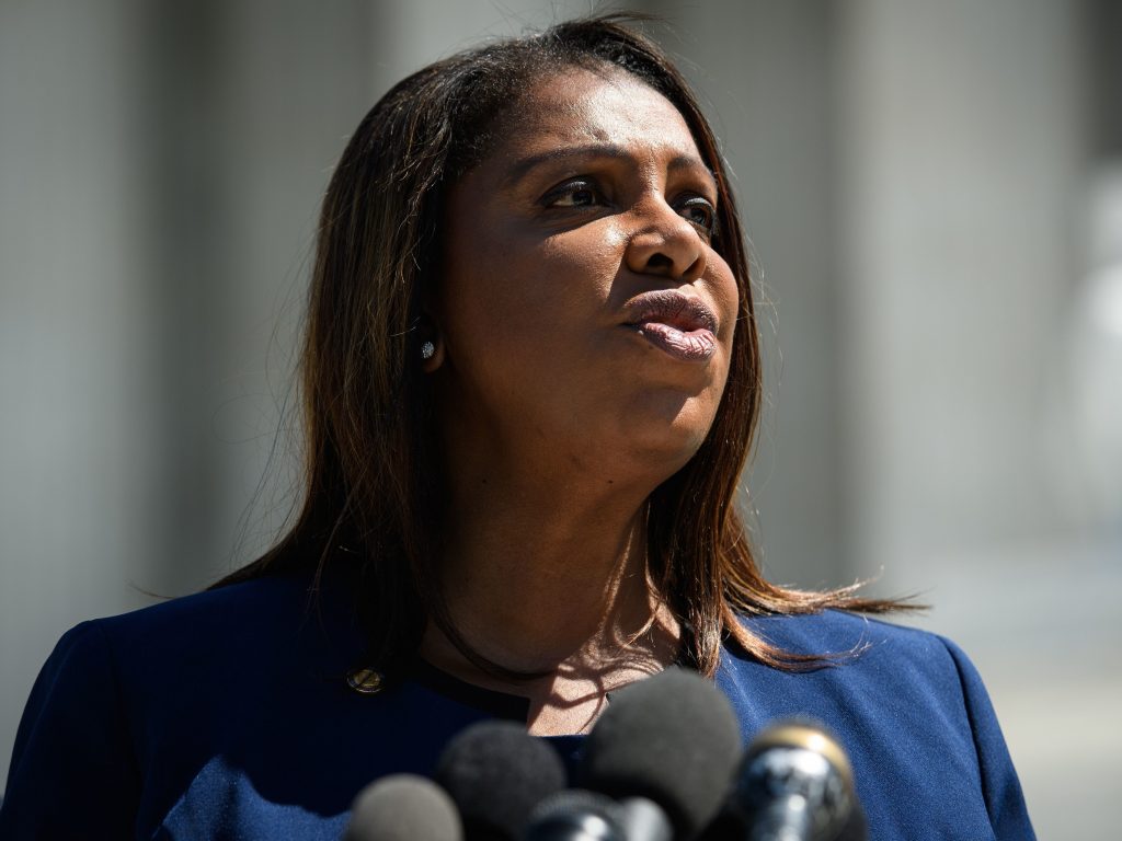New York Attorney General Letitia James’ investigation into the Trump Organization has expanded into a criminal probe, her office confirmed. New York Attorney General Letitia James stands in front of a mic