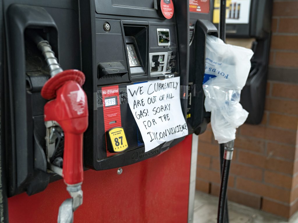 Cars line up Tuesday at a QuikTrip in Atlanta. Continued panic-buying is leading to shortages at gas stations across the Southeast after a hack attack shut down a critical pipeline. Cars line up Tuesday at a QuikTrip in Atlanta. Continued panic-buying is leading to shortages at gas stations across the Southeast after a hack attack shut down a critical pipeline. (Megan Varner/Getty Images)