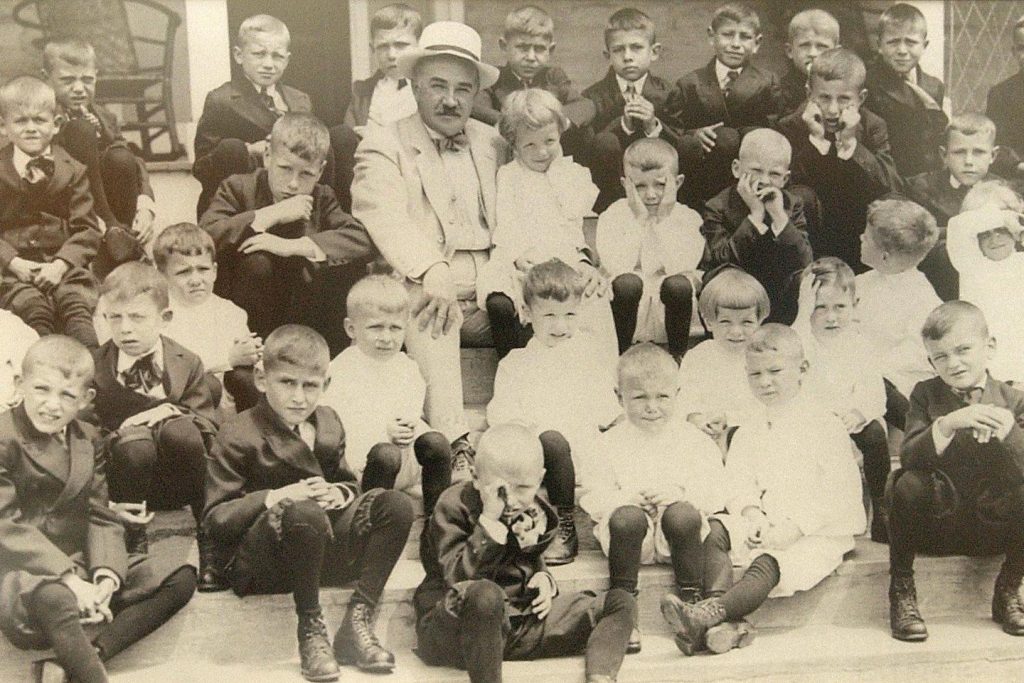 Milton Hershey and the early students of the school that bears his name in 1913. (Courtesy of Milton Hershey School)