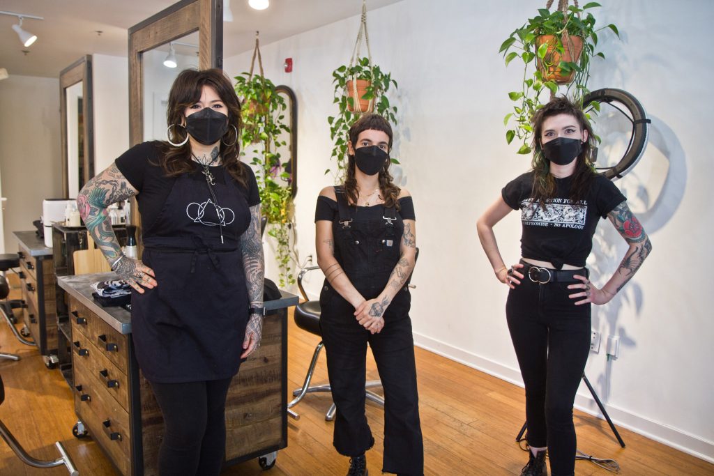 hairsalon-transfiguration-genderfree-03 Angel Indelicato, owner of Transfiguration Hair Studio, (left) haircrafter Lola González-Heres (center) and haircrafter Hailey Sykes
