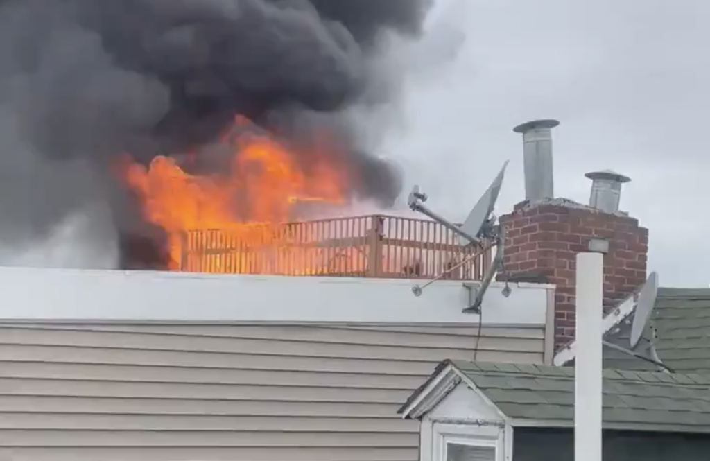 northern_liberties_house_fire_052421 A fire is seen from the roof of a Northern Liberties home