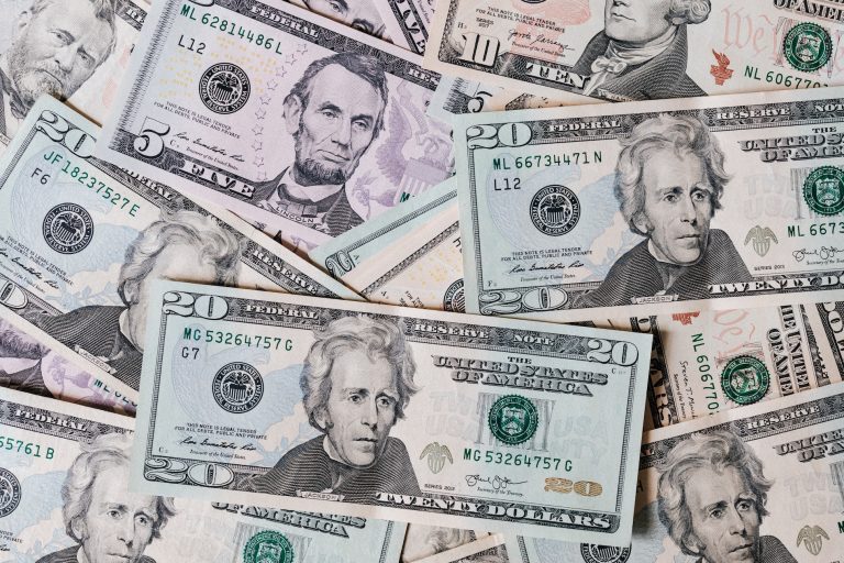 Pictures of various dollar bins, including twenties and fives