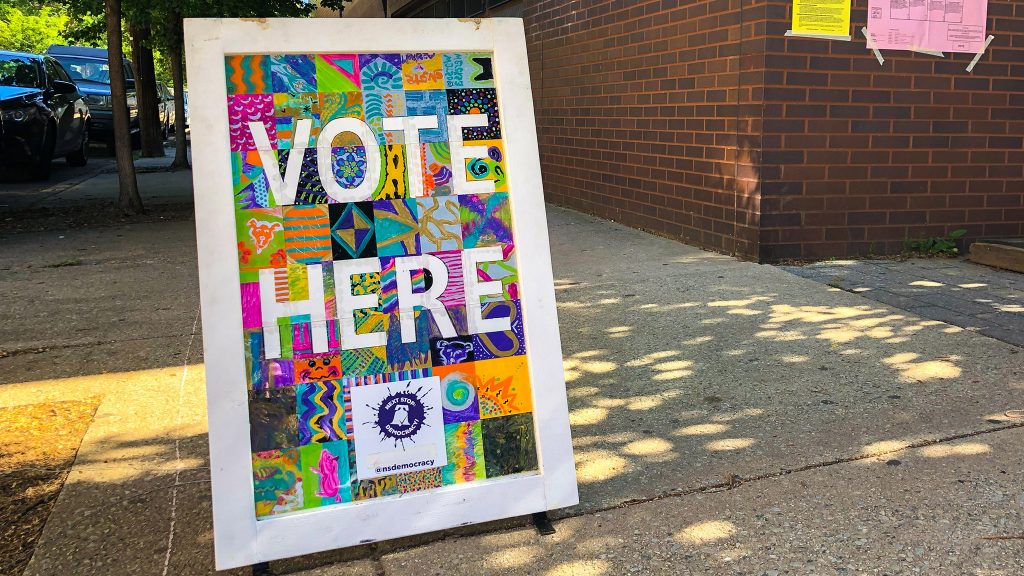votehere-pollingplace-crop A colorful sign says