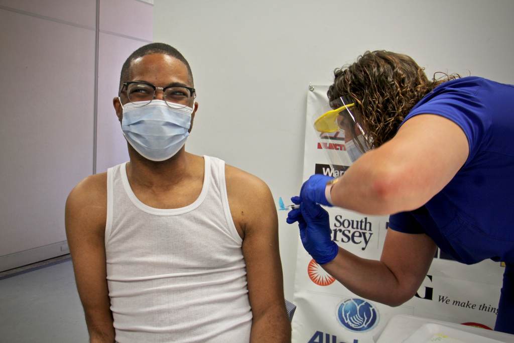 2021 06 16-e lee-sean brown-penns grove nj puerto rican action committee-covid vaccine clinic shot Sean Brown receives a COVID-19 vaccine