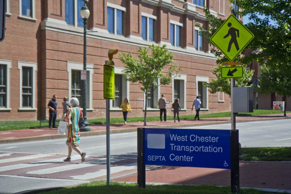 The exterior of the West Chester transportation building alongside a crosswalk