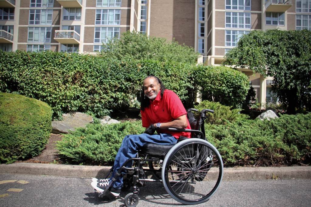 2021 06 25-e lee-charles horton-philadelphia-disability pride 2 Charles Horton sits in a wheelchair outside