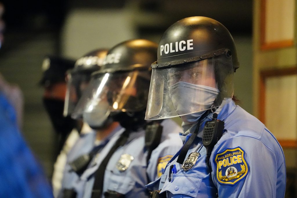 Philadelphia Police Shooting Philadelphia police stand in position during a march by protesters Tuesday Oct. 27, 2020 in Philadelphia. Hundreds of demonstrators marched in West Philadelphia over the death of Walter Wallace, a Black man who was killed by police in Philadelphia. (AP Photo/Matt Slocum)