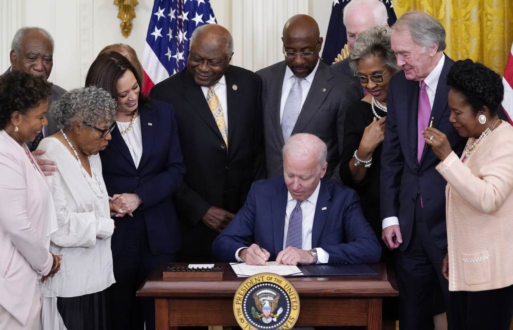 Joe Biden President Joe Biden signs the Juneteenth National Independence Day Act, in the East Room of the White House, Thursday, June 17, 2021, in Washington. (AP Photo/Evan Vucci)
