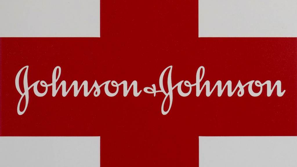 Opioid Lawsuit Settlement This Feb. 24, 2021 photo shows a Johnson & Johnson logo on the exterior of a first aid kit in Walpole, Mass. The New York attorney general says Johnson & Johnson has agreed to pay $230 million to settle claims that the pharmaceutical giant helped fuel the opioid crisis. The deal requires Johnson & Johnson to make a series of payments over nine years to cover total. (AP Photo/Steven Senne)