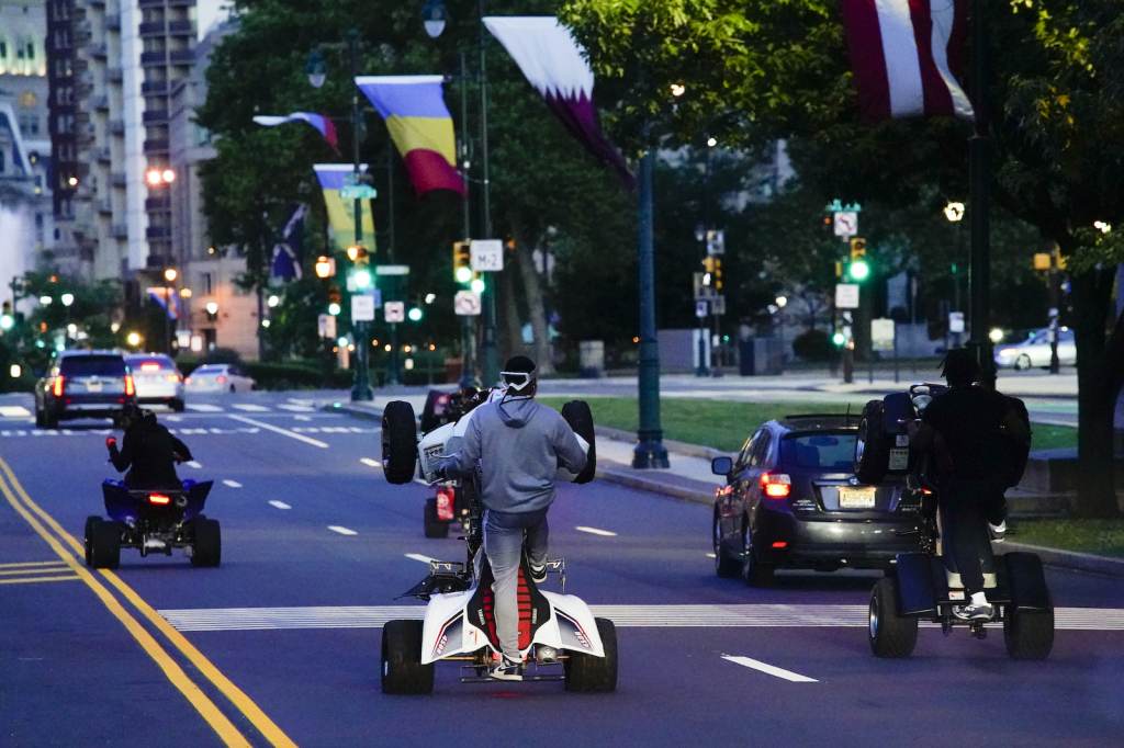 Pennsylvania Daily Life ATVs riders travel down the Benjamin Franklin Parkway