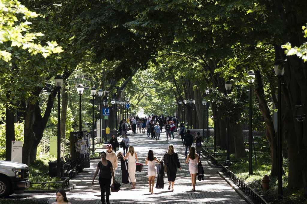 University of Pennsylvania People walk along University of Pennsylvania's campus in the spring