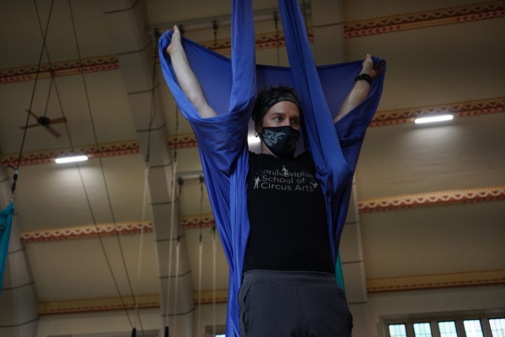 Adam-Woolley-instructing-the-class-on-the-aerial-swing Adam Woolley instructing the class on the aerial swing. (Kenny Cooper/WHYY)