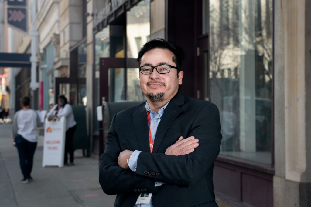 Steven3 Steven Larín stands outside with his arms folded