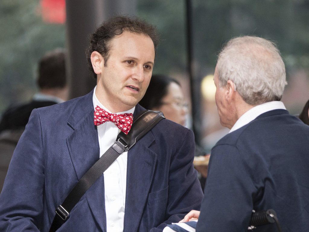 Dr. Aaron Kesselheim (left), a professor at Harvard Medical School, at a documentary film screening in 2018 in Boston. He has resigned from a Food and Drug Administration advisory panel over the FDA’s decision to approve an Alzheimer’s drug. Dr. Aaron Kesselheim (left), a professor at Harvard Medical School, at a documentary film screening in 2018 in Boston. He has resigned from a Food and Drug Administration advisory panel over the FDA's decision to approve an Alzheimer's drug. (Scott Eisen/AP Images for AIDS Healthcare Foundation)