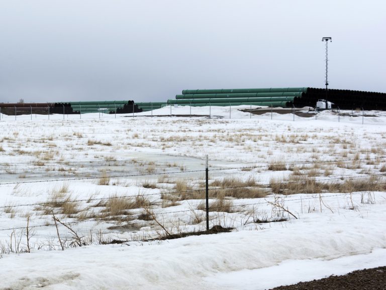 A storage yard is seen in Montana for pipe that was to be used in the construction of the Keystone XL oil pipeline. The developer has now canceled the controversial project. (Al Nash/Bureau of Land Management via AP)