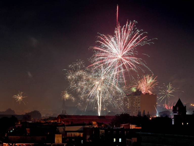 People set off consumer aerial fireworks in the City of Reading