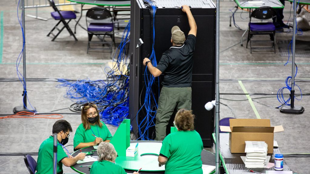 Arizona ballot recount Contractors examine and recount ballots from the 2020 general election