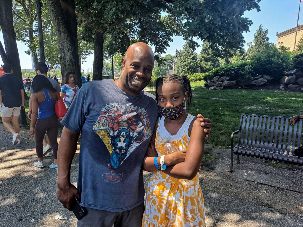 Obie Hazzard stands with his daughter Justice