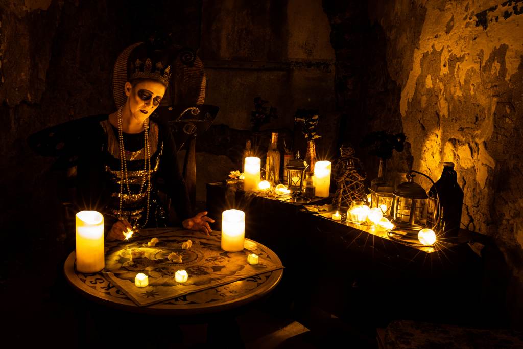 1-(3) A fortune teller in The Speakeasy at Al Capone’s cell at Eastern State Penitentiary for its upcoming Halloween Nights festival. (Courtesy of ESP)