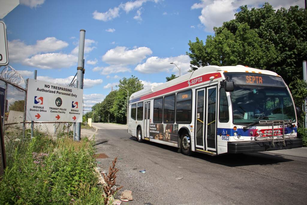 2021 06 23-e lee-philadelphia nicetown midvale bus depot-natural gas plant A bus leaves the Midvale depot in Nicetown