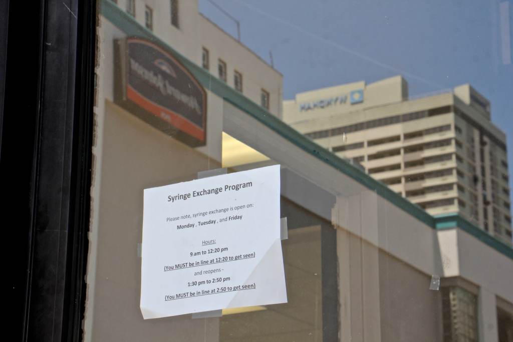 Wyndam and Howard Johnson hotels loom over the Oasis storefront in Atlantic City