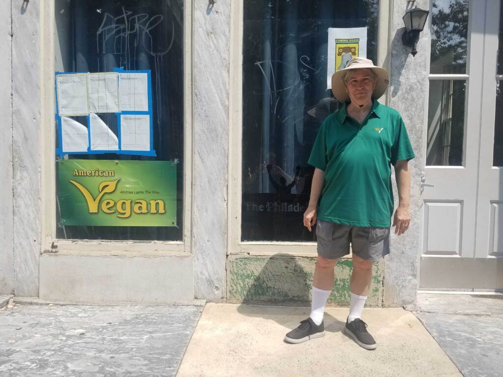 Vance Lehmkuhl stands outside the American Vegan Society space on 2nd Street