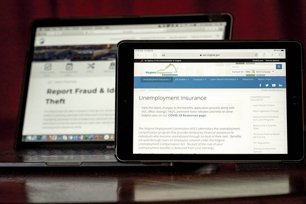 Virus Outbreak Unemployment Fraud Web pages used to show information for collecting unemployment insurance in Virginia, right, and reporting fraud and identity theft in Pennsylvania, are displayed on the respective state web pages, Friday, Feb. 26, 2021, in Zelienople, Pa. (AP Photo/Keith Srakocic)