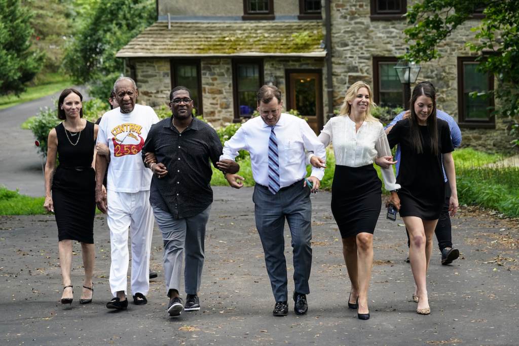 Bill Cosby Bill Cosby, second left, and spokesperson Andrew Wyatt, third left, approach members of the media gathered outside Cosby's home in Elkins Park, Pa., Wednesday, June 30, 2021, after Pennsylvania's highest court overturned his sex assault conviction. (AP Photo/Matt Rourke)
