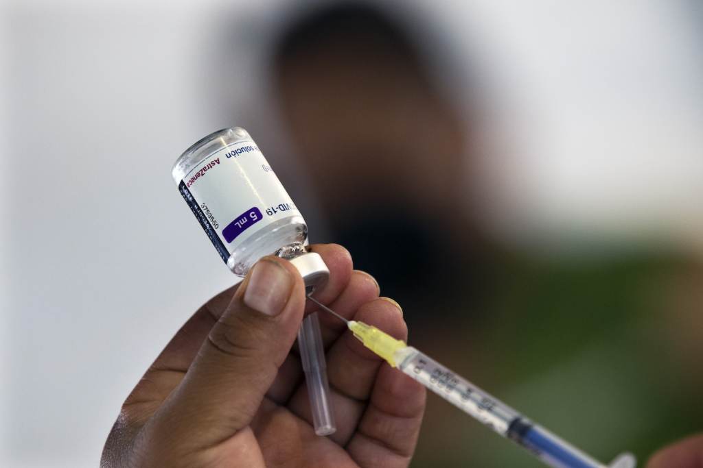 Virus Outbreak Mexico A health worker prepares to administer a jab of the AstraZeneca COVID-19 vaccine during a vaccination drive for people ages 30 to 39 in Mexico City, Wednesday, July 7, 2021. (AP Photo/Marco Ugarte)