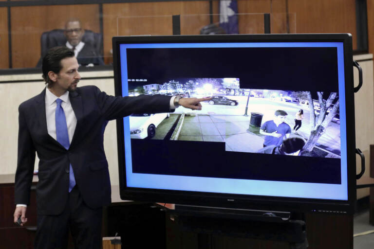 Prosecutor Dan Goldberg points to defendant Nathaniel Rowland's car circling the block as Samantha Josephson waits for an Uber while delivering closing arguments during Rowland's trial, Tuesday, July 27, 2021, in Richland County Circuit Court in Columbia, S.C. Rowland was convicted Tuesday for the 2019 abduction and murder of the 21-year-old college student, who mistook his car for her Uber ride. (Tracy Glantz/The State via AP, Pool)