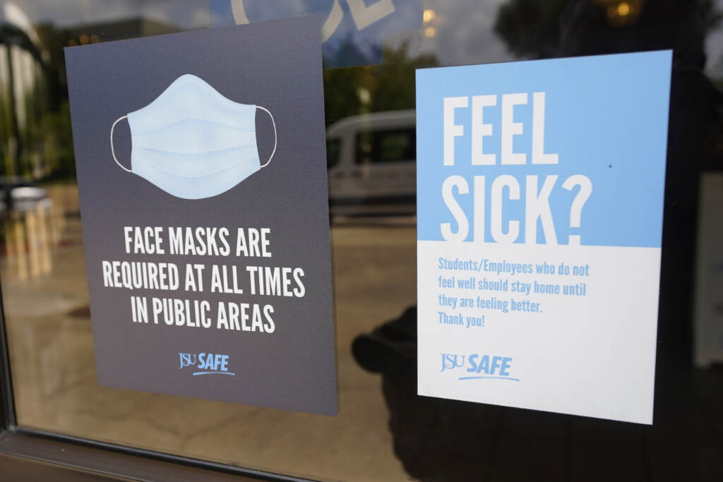 Virus Outbreak The CDC announced new recommendations that vaccinated people return to wearing masks indoors in parts of the U.S. where the coronavirus is surging. (AP Photo/Rogelio V. Solis)
