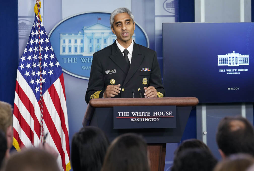 Vivek Murthy Surgeon General Dr. Vivek Murthy speaks from a podium at the White House briefing room