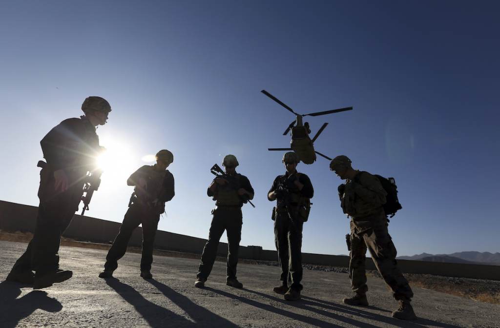 Afghanistan Intelligence Losses FILE - In this Nov. 30, 2017, file photo, American soldiers wait on the tarmac in Logar province, Afghanistan. (AP Photo/Rahmat Gul, File)