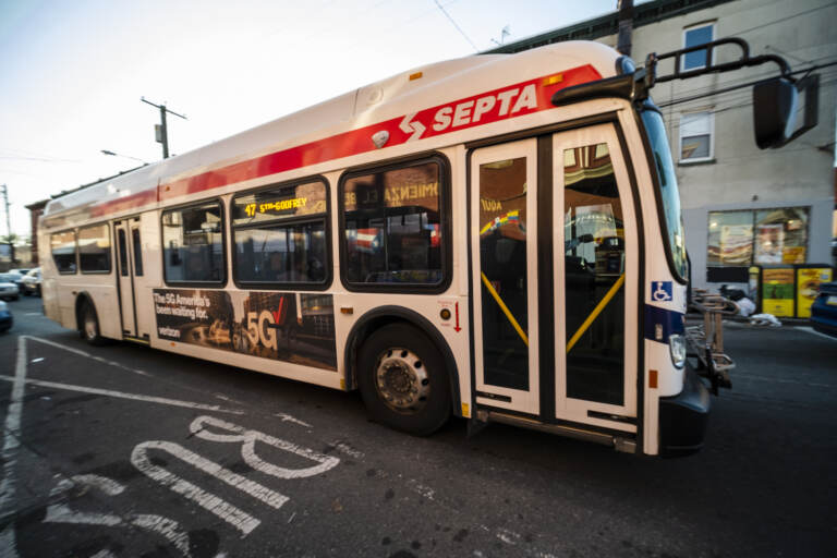 A SEPTA bus travels down a street in Philadelphia