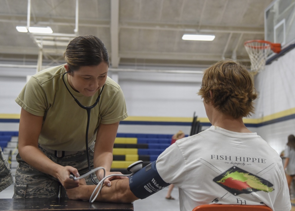 Guard care U.S. Air Force Airman 1st Class Sarah Dickmann, a medical technician with the 187th Air Refueling Wing in Milwaukee, Wisconsin, takes part in a 2018 Innovative Readiness Training Mission in Monroeville, Alabama. (U.S. Air National Guard photo by Airman Cameron Lewis)