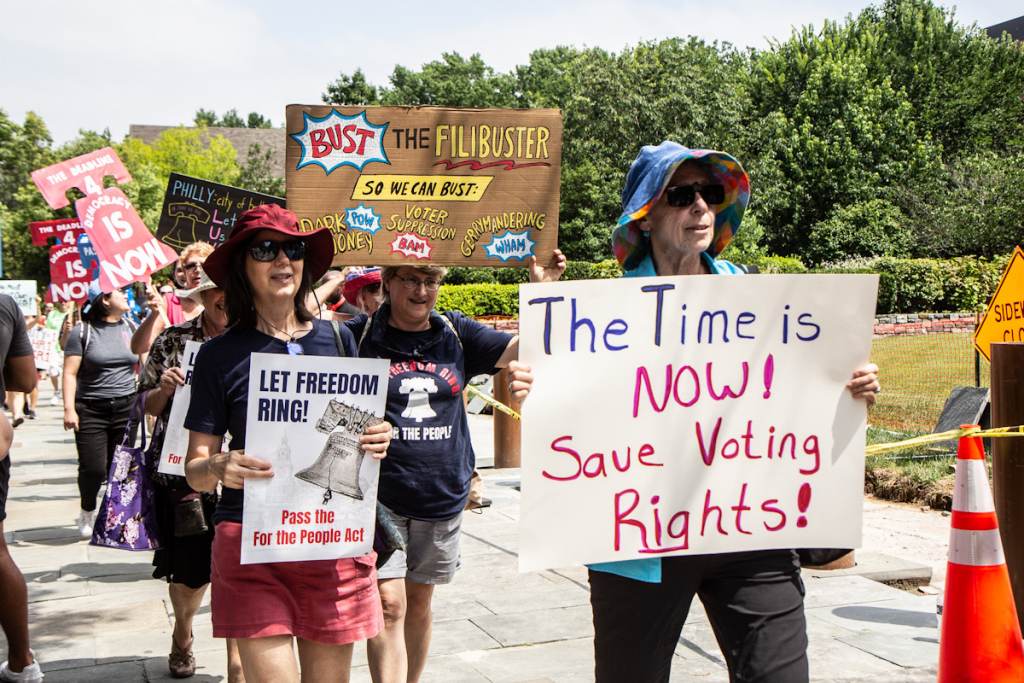 IMG_8087 Voters in Philadelphia rallied in support of the For The People Act outside the National Constitution Center during a speech given by President Joe Biden. (Kimberly Paynter/WHYY)
