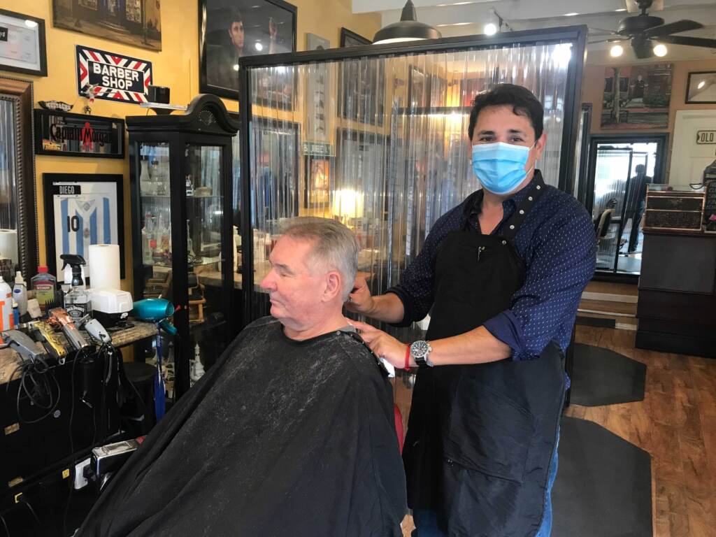 Image from iOS (4) Diego Rivera cuts Michael Kane’s hair