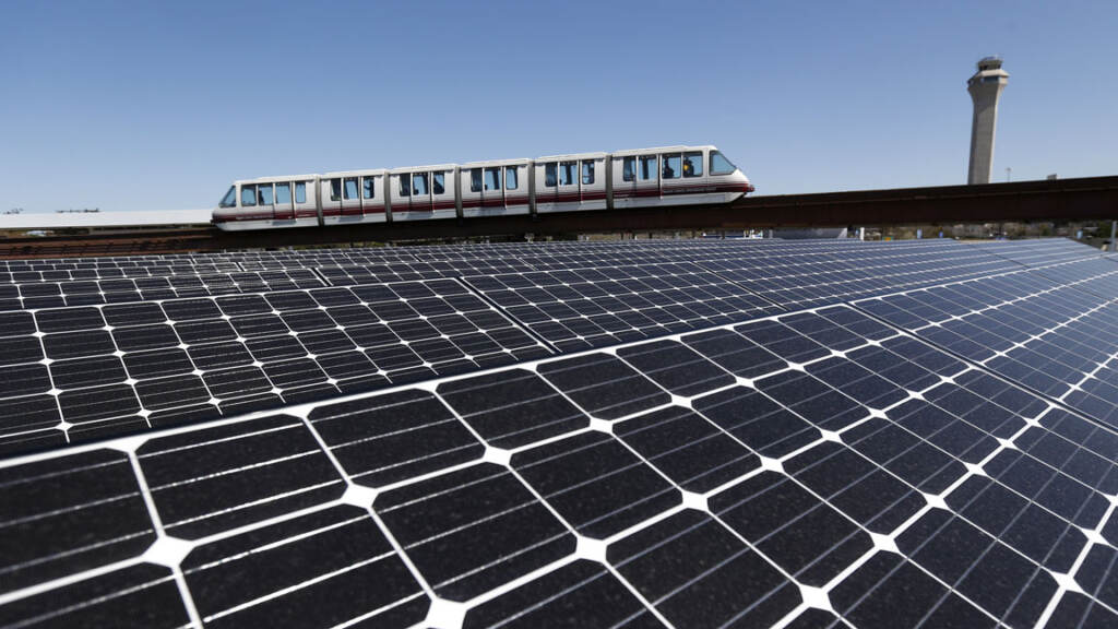 Solar-panels-array-power-clean-energy Rooftop solar panels are pictured at Newark Liberty International Airport
