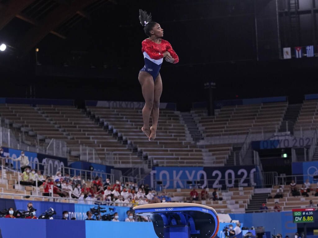 Tokyo Olympics Artistic Gymnastics Simone Biles from the U.S. performs on the vault during the gymnastics