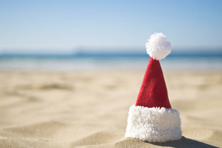 Christmas on the beach with santa hat
