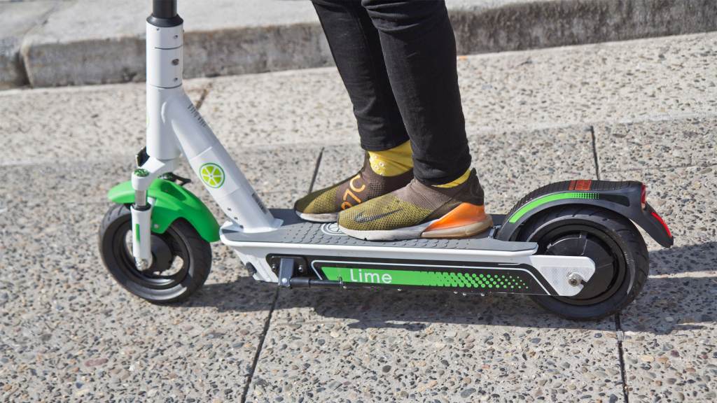 FILE - Riders were invited to test drive the Lime scooter at City Hall in Philadelphia. (Kimberly Paynter/WHYY)