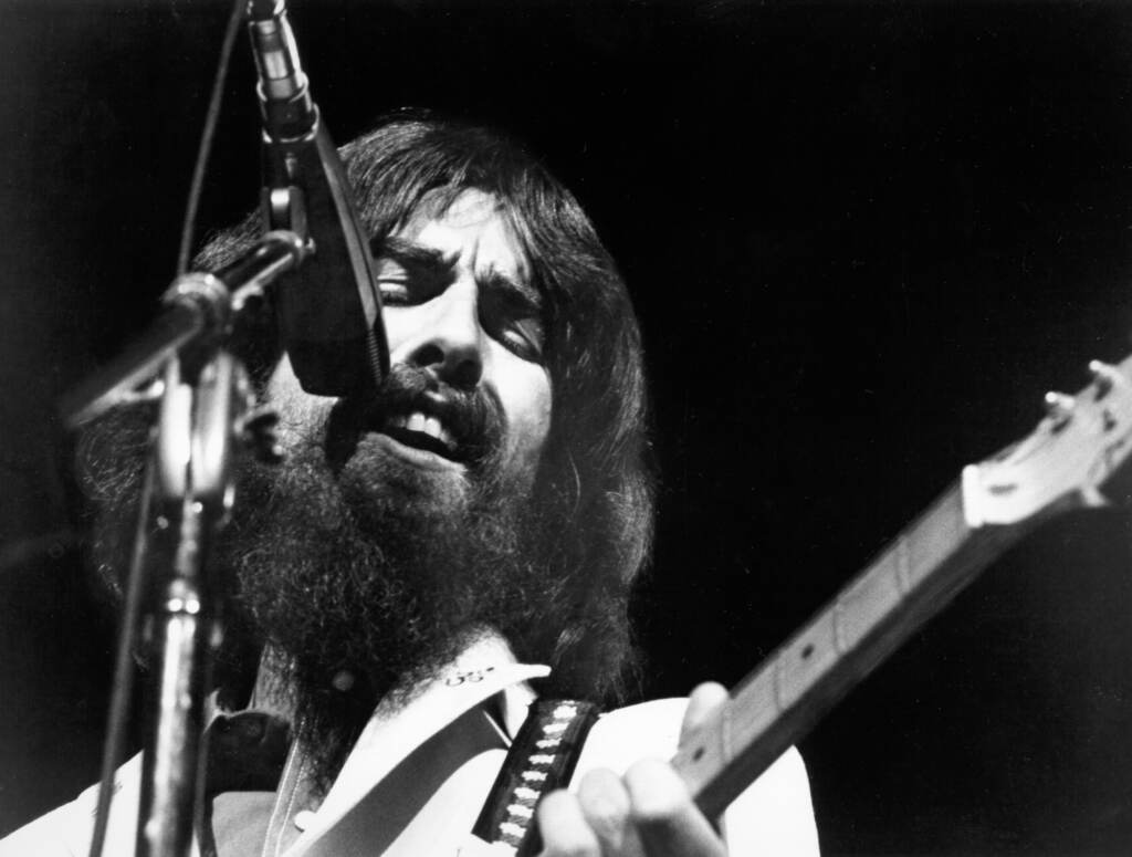 George Harrison performs at the Concert for Bangladesh, held at Madison Square Garden on August 1, 1971 in New York City. Asked why he joined in organizing the event, he said, “Because I was asked by a friend if I’d help, that’s all.” George Harrison performs at the Concert for Bangladesh, held at Madison Square Garden on August 1, 1971 in New York City. Asked why he joined in organizing the event, he said,