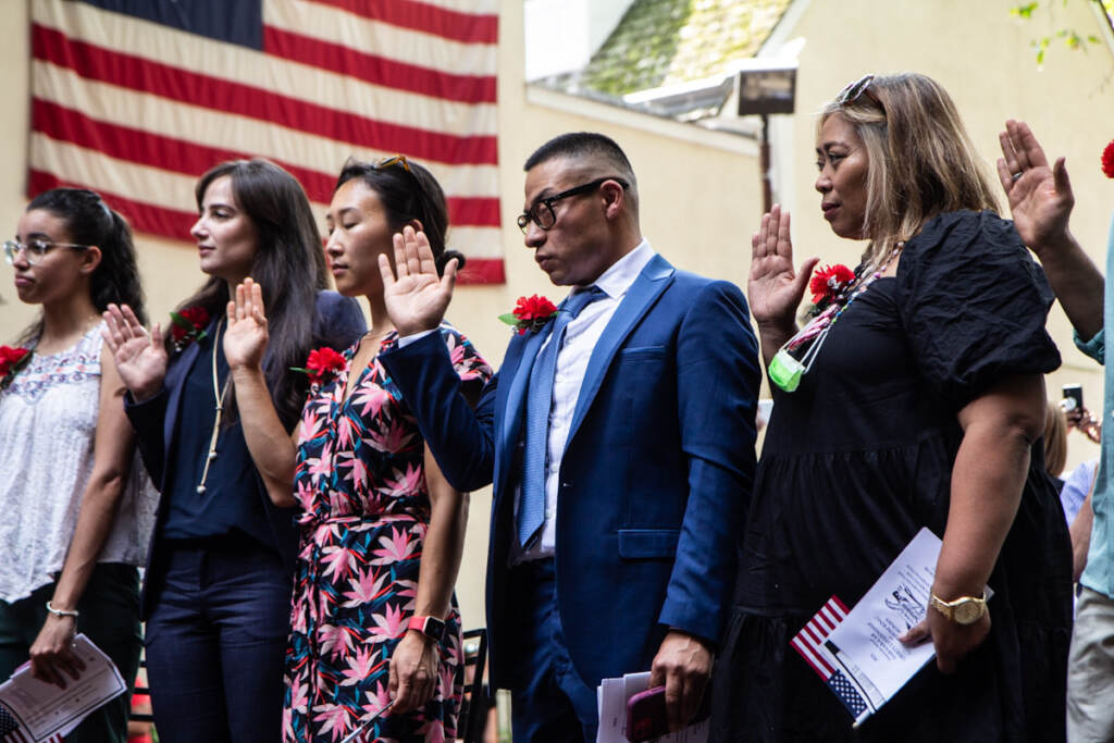 naturalization_ceremony_KP_071521_01 People participate in a naturalization ceremony at the Betsy Ross House