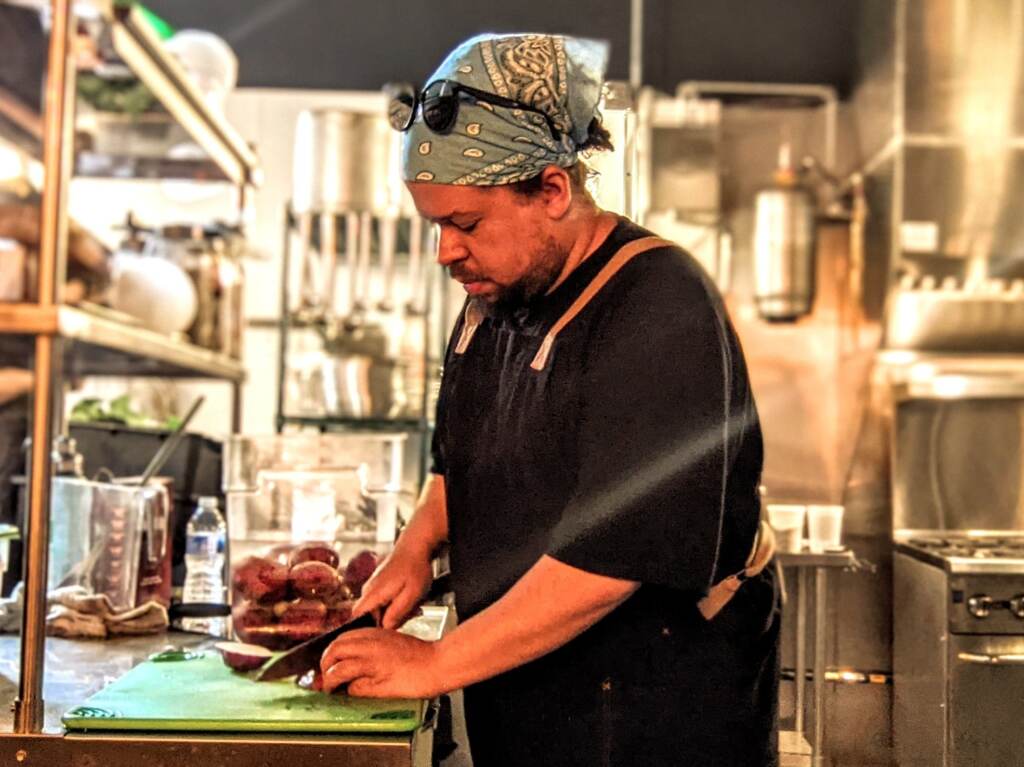 Lamar Cornett has worked in restaurants for more than 20 years. During the pandemic, he began thinking about leaving that career behind. Lamar Cornet works inside a restaurant